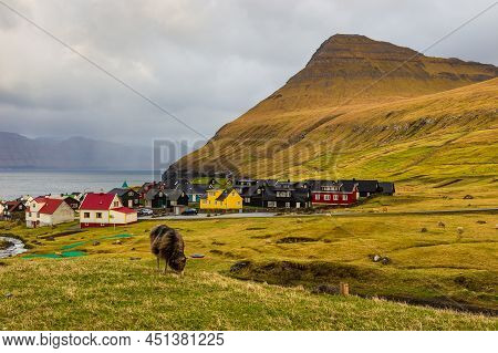 Gjogv, Faroe Islands, Denmark - 05 May 2018: Small Village Gjogv Situated On The Slope Of The Mounta