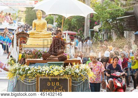 Samut Prakan, Thailand - May 12, 2012: Buddhist Monk Sprinkling The Holy Water During Songkran Festi