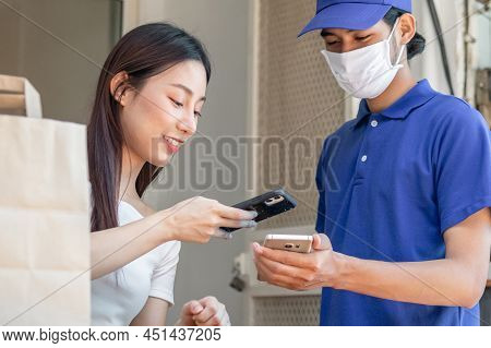 Beautiful Asian Young Woman, Girl Client Use Mobile Phone Scan Accept Delivery Of Baggage, Cardboard