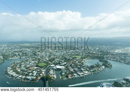 Surfer's Paradise Aerial View House Lined Canal With Clouds Drifting By