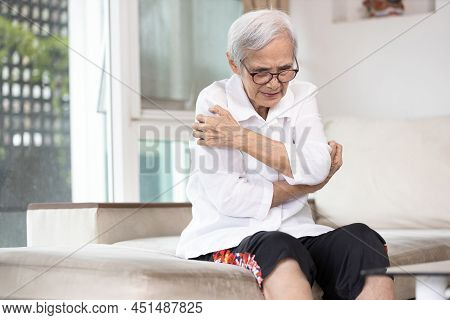 Itchy Senior Woman Scratching Arms With Her Hands,rash On Body,pruritus,severe Itching Of The Skin F
