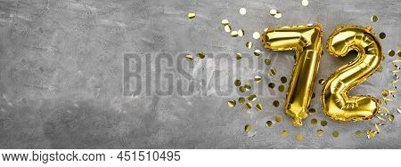 Yellow Foil Balloon Number, Number Seventy Two On A Concrete Background. Greeting Card With The Insc