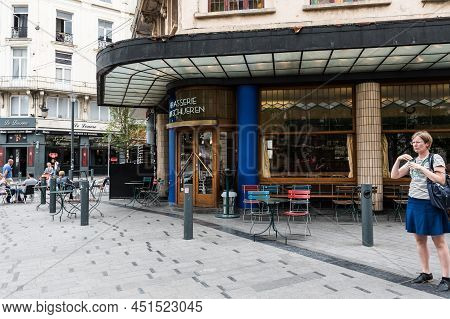 Saint Gilles, Brussels, Belgium - 07 08 2019- Facade, Square, Terrace With People Drinking Outside O