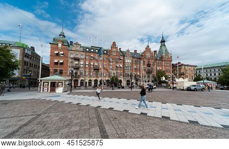 Sundsvall, Vastnorrland County - 08 02 2019: Tourists And Locals Walking Over The Main City Square W