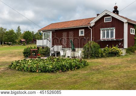 Segersta, Halsingland - Sweden - 08 04 2019: View Over Traditionale Swedish Holiday Homes In The Fie
