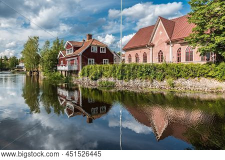 Falun, Dalarna - Sweden - 08 05 2019 Panoramic View Of The City Reflecting In The Nybron River
