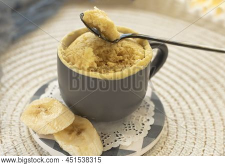 Homemade Portioned Banana Bread Mugcake In Small Mugs.