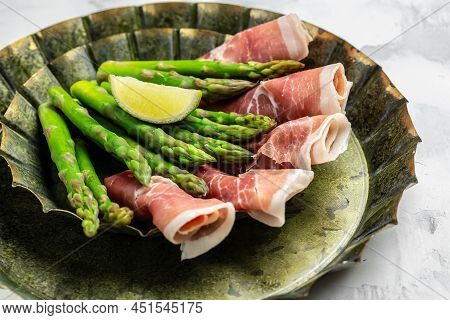 Asparagus. Bunch Of Fresh Asparagus, Jamon, Ham, Prosciutto Pickled Green Asparagus. Close Up. Keto 