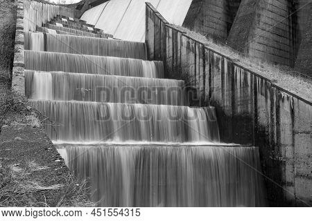 Long Exposure Of The Waterfalls Flowing Over Wimbleball Dam In Somerset