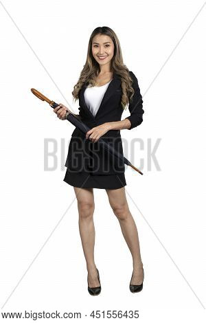 Businesswoman In Black Suit Standing And Holding Umbella In Hands On White Background.