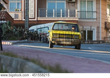Side; Turkey - March 01 2022:  Old Retro Yellow Fiat Car Driving On The Highway