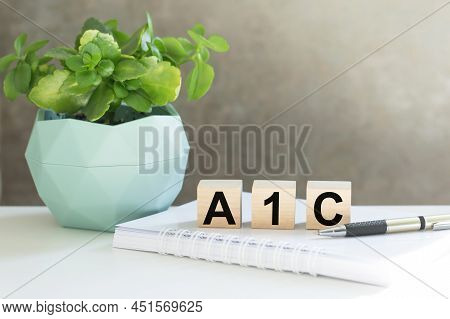 A1c Text On Wooden Cubes On An Office Desk, Medical Concept