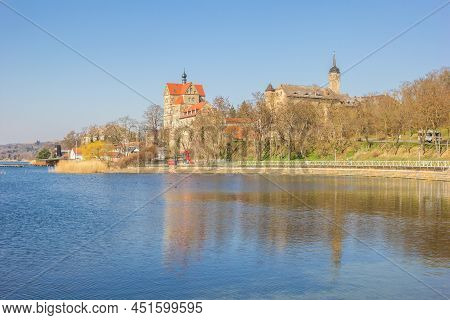 Blue Lake In Front Of The Historic Castle In Seeburg, Germany
