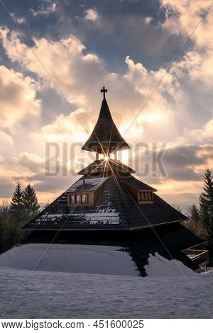 Golden Hour By Bell Tower In Traditional Carpathian Style In Solan, Beskid Mountains, Czech Republic
