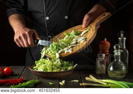 Napa Cabbage Salad Preparation. Cook While Working In The Restaurant Kitchen. Diet Breakfast Or Dinn