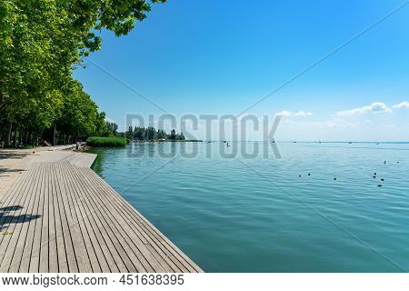 Promenade In Balatonfured Next To Lake Balaton With Wooden Lakeside
