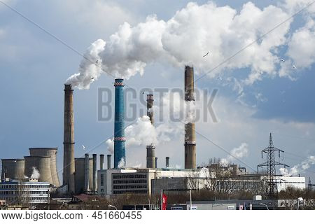 Bucharest, Romania - March 10, 2022: The Chimneys Of The Cet Sud Power Plant, Which Pollute With Smo