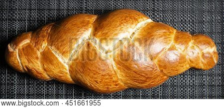 Beautiful Three Braid Golden Baked Bread With Egg Wash. Challah Is A Special Bread Of Ashkenazi Jewi