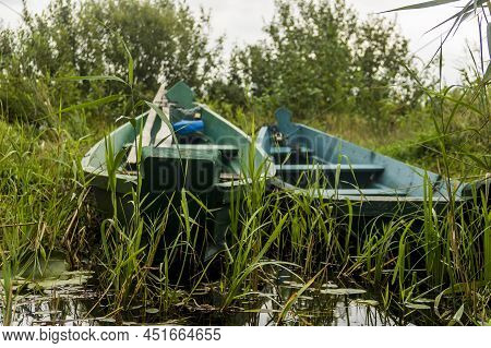 Old Wooden Boat On The Lake
