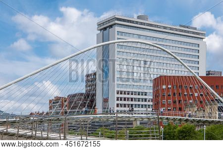 Bilbao, Spain - June 14, 2018:  View Of  The Zubizuri Bridge Ion The Nervion River