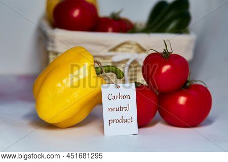 Carbon Neutral Product Label On Tomatoes And Yellow Bell Pepper. Carbon Labeling. Net Zero Carbon, E