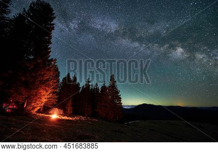 Stunning Starry Sky During Night In Picturesque Carphathians Mountains For Visiting National Park, C