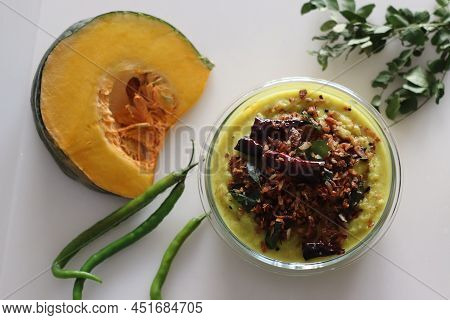 Coconut Based Pumpkin Curry. A Pumpkin Side Dish To Go With Rice, Part Of Kerala Meals. Commonly Kno