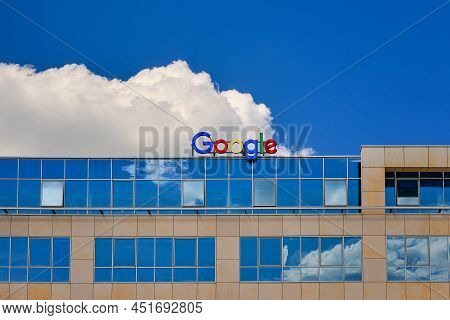Wroclaw, Poland - Jun 6, 2021. Google Sign Or Logo On Top Of The Office Building. Blue Sky, Daytime,