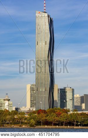 Pricewaterhousecoopers Skyscraper At Danube River In Autumn, Vienna, Austria - October 2021