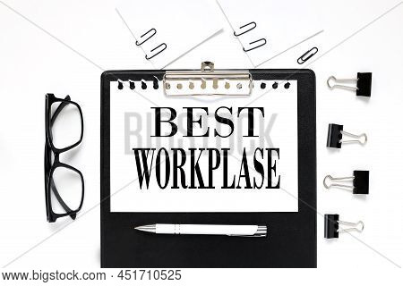 Best Workplase. White Paper Text On Black Folder Near Glasses