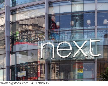 Manchester, United Kingdom - 24 March 2022: Sign On The Front Of The Next Clothing Store In Exchange