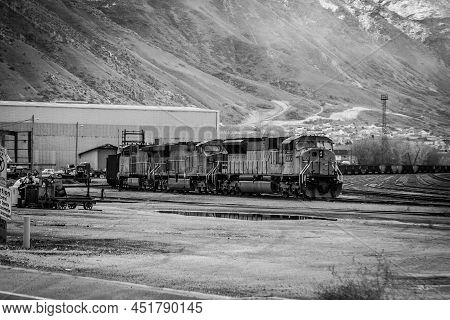 Locomotive Train Parked In Rail Yard Black And White