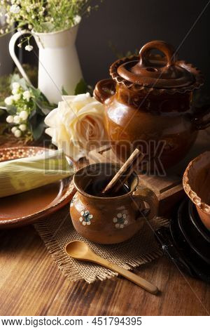 Authentic Homemade Mexican Coffee (cafe De Olla) Served In Traditional Clay Mug (jarrito De Barro) O