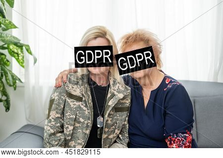 Gdpr - General Data Protection Regulations Military Concept. Soldier Offers A Padlock With Gdpr Word