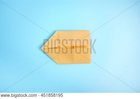 Origami Bunny. Step-by-step Photo Instruction On A Blue Background. Easter Bunny. Diy Concept Step5.