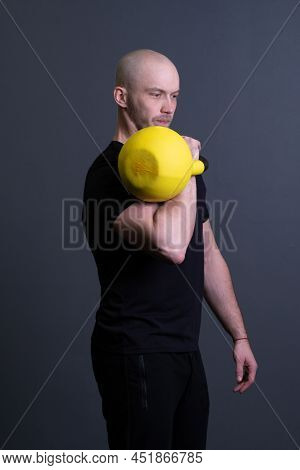 Guy With A Yellow Kettlebell Gym Anonymous Young Man, For Motivation Effort In Painted From Up Sport