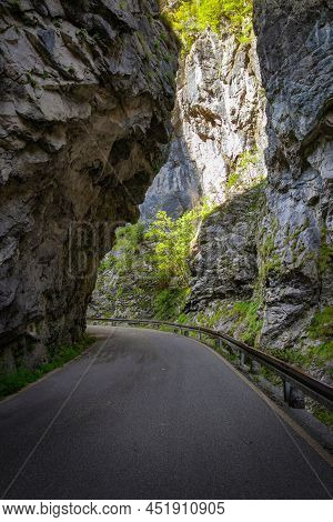 Mountain Road In The Gorge Of The Mountains Near The City In Italy San Pelegrino
