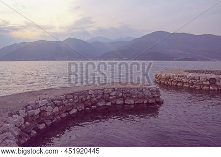 Evening Mediterranean Landscape. Montenegro, Adriatic Sea, View Of Bay Of Kotor, Tivat. Mandrac (man