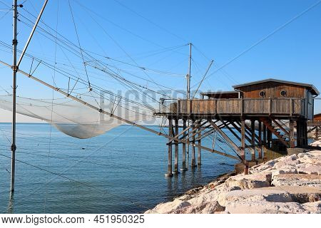 Large Fishing Hut And The Immense Nets For Catching Fish And Crustaceans In The Adriatic Sea In Ital