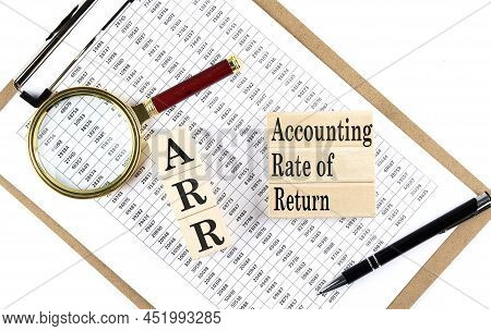 Arr Text On A Wooden Block On Chart Background