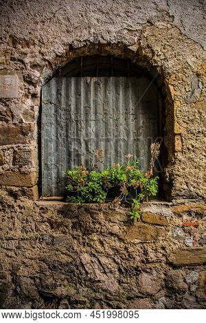 A Window In A Derelict House In Poffabro, An Historic Medieval Village In The Val Colvera Valley In 