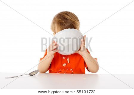 Little boy eating the oatmeal