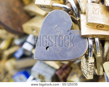 PARIS - DEC 6: Love Padlocks at Pont de l'Archevche on December 6, 2013, in Paris. The thousands of locks of loving couples symbolize love forever.