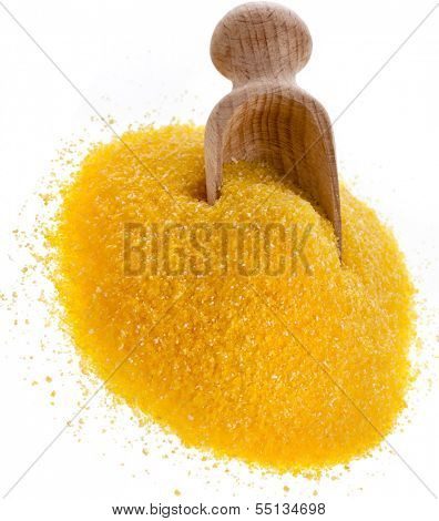 Uncoocked cornmeal  flour heap and wooden spoon scoop isolated on white background 