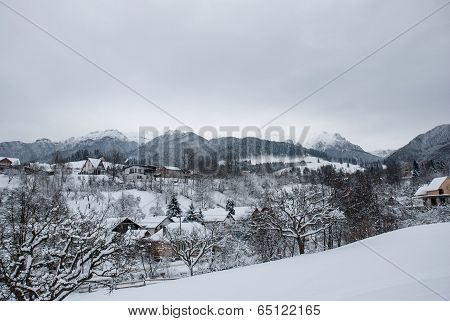 Winter landscape. Mountain village in the Bran,Romanian Carpathians