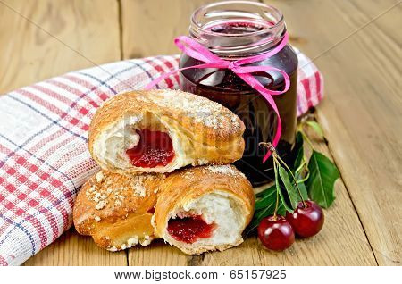 Bun With Cherry Jam And Berries On Board