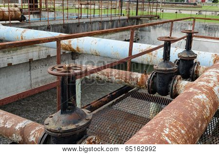 Rusty Big Tap And Pipes And Water Treatment Liquid