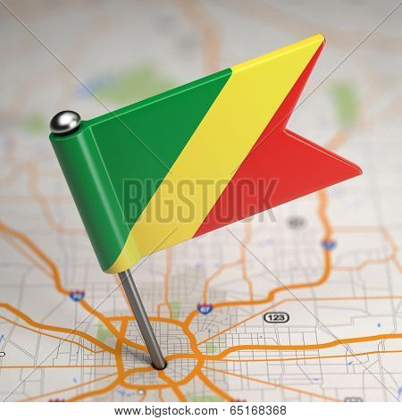 Republik of the Congo Small Flag on a Map Background.