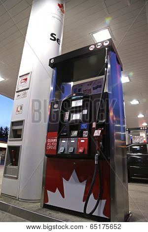 PORT COQUITLAM, CANADA - May 10, 2014 : One side of Petro Canada gas station on May 10, 2014. The company retained the Suncor Energy name for the merged corporation and its upstream operations. 
