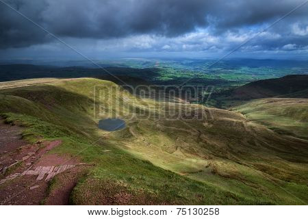 Beautiful Landscape Of Brecon Beacons National Park With Moody Sky